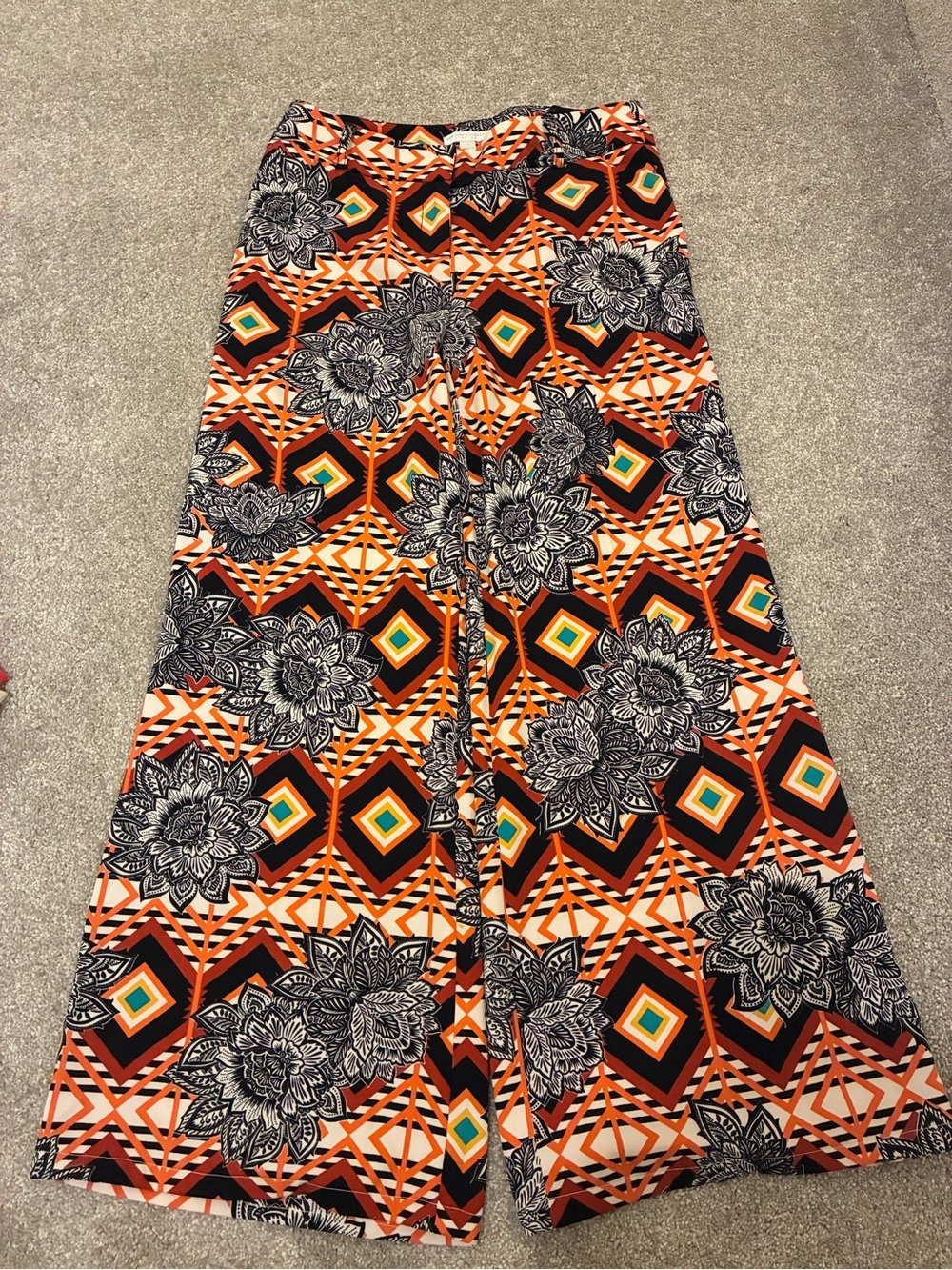 New York & Company Orange & Black Floral Geo Boot-Cut Jumpsuit Pants